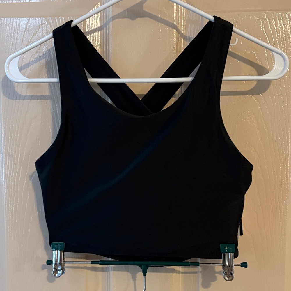 NWT women’s baleaf swim top. Women’s size 34 in black meant for large bust.